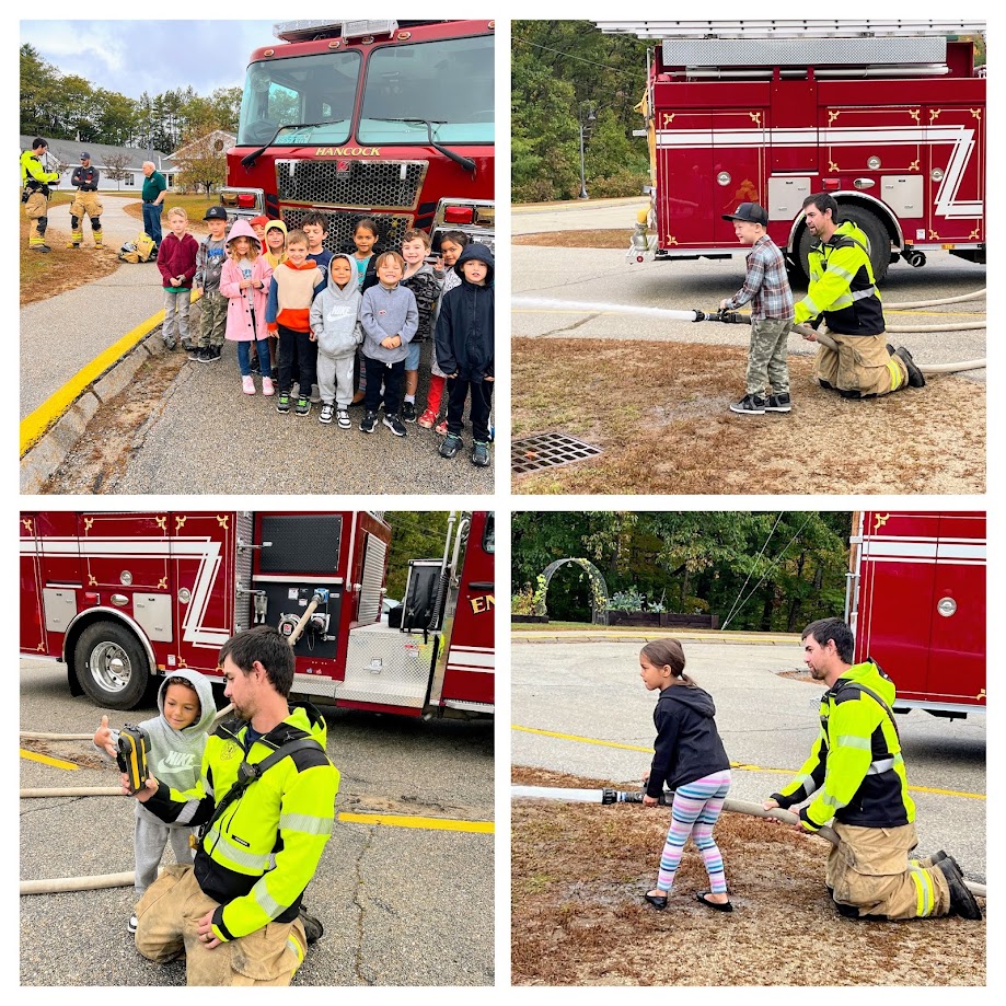 students holding the hose